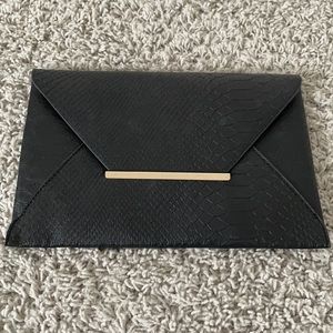 BCBG Black Snakeskin Clutch
